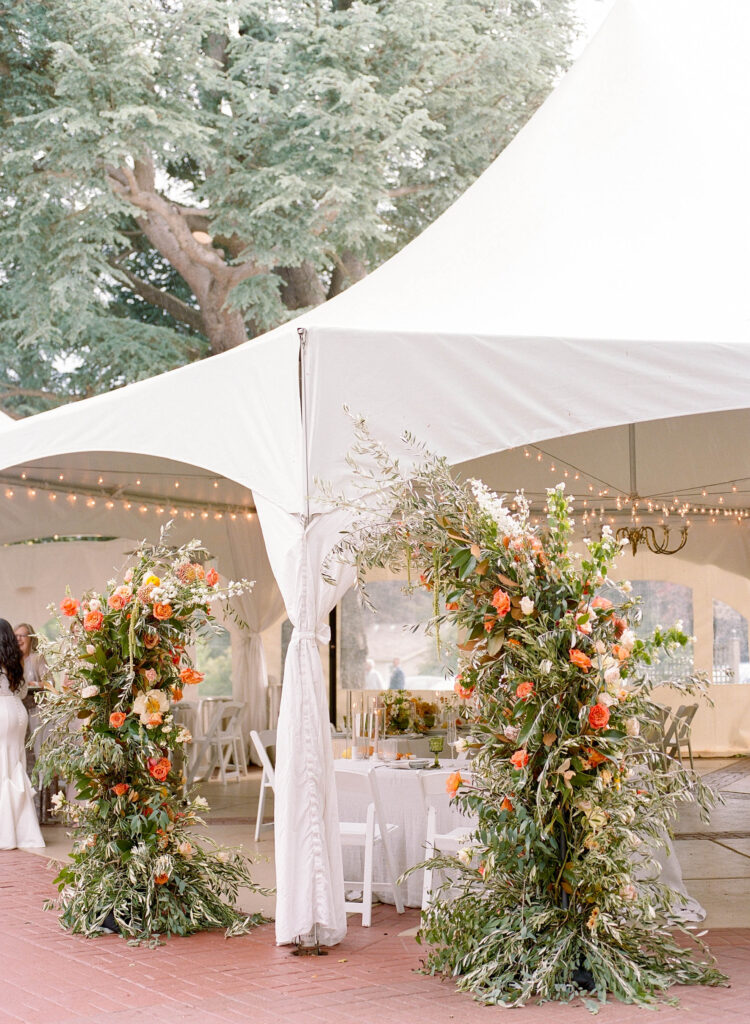 lairmont manor wedding tent with floral arch